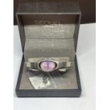 AN AS NEW SEQUEL WRIST WATCH IN A PRESENTATION BOX SEEN WORKING BUT NO WARRANTY GIVEN