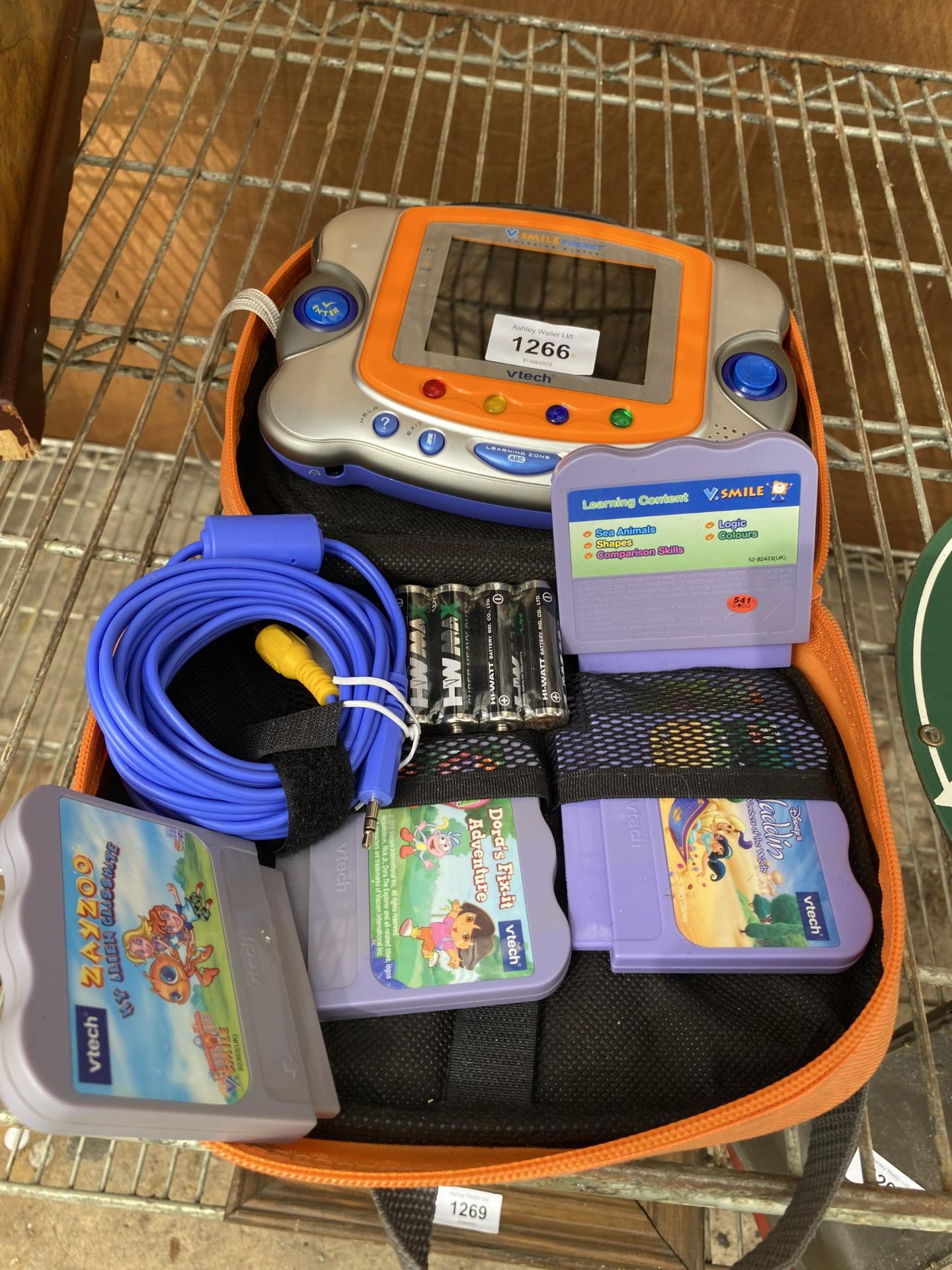 A VTECH CHILDRENS GAME CONSOLE