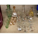 FOUR GLASS DECANTERS WITH HORSE PRINTS PLUS PHEASANT THEMED SHERRY GLASSES, AND A QUANTITY OF