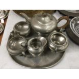 A PEWTER TEASET TO INCLUDE TEAPOT, SUGAR BOWL MILK AND CREAM JUG ON A TRAY