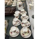 A BONE CHINA COFFEE SET 'LUBERN' PATTERNED WITH ROSES TO INCLUDE COFFEE POT, CREAM JUG, CUPS,