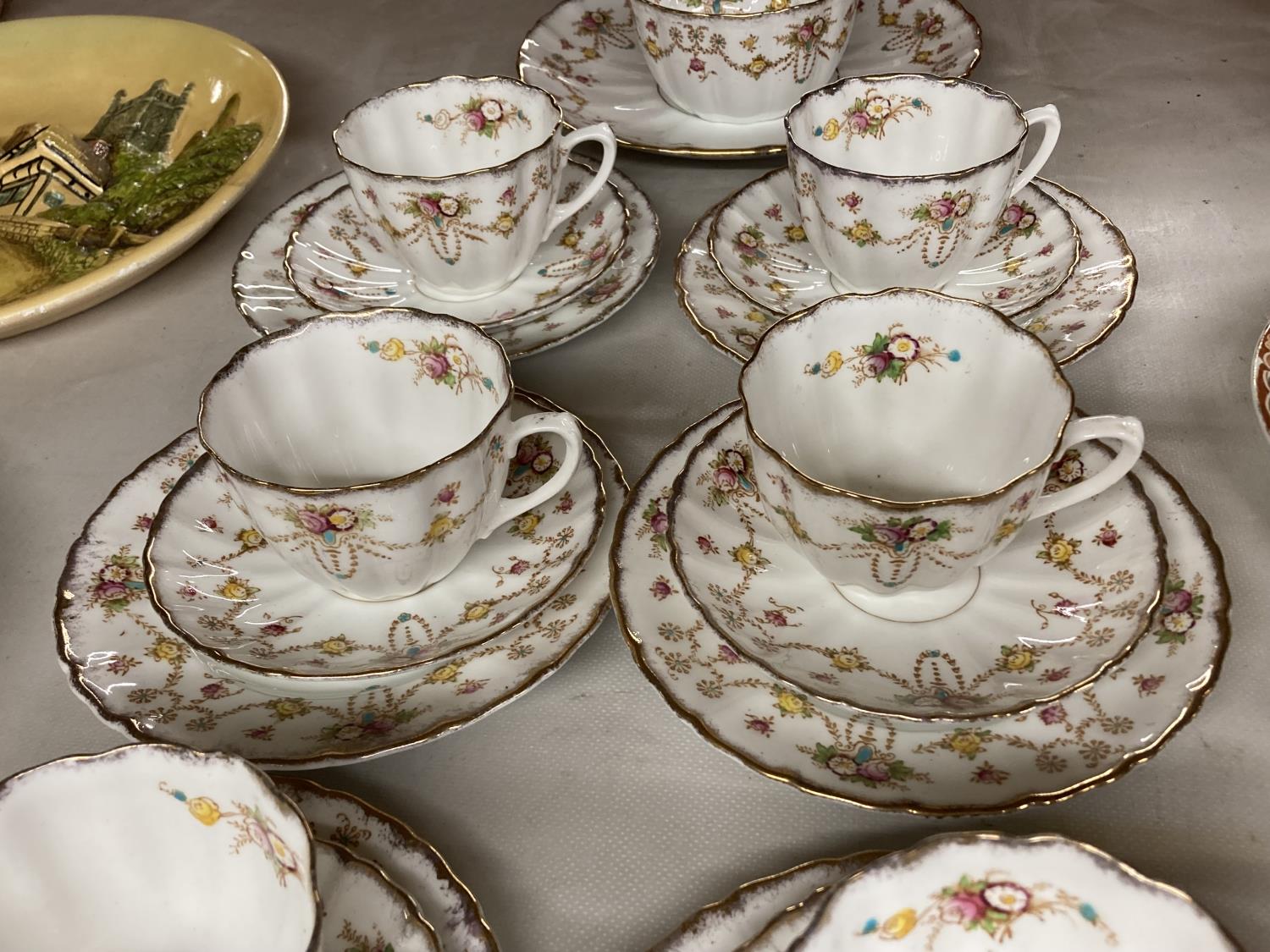 A 'MICHAEL' CHINA TEASET WITH FLORAL SWAG DESIGN TO INCLUDE CAKE PLATE CREAM JUG, SUGAR BOWL, - Image 2 of 5