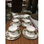 A ROYAL STANDARD GREEN AND FLORAL CHINA TEASET TO INCLUDE CAKE PLATE, CREAM JUG, SUGAR BOWLS,