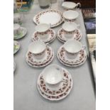 A CHINA PART TEASET 'DIANE' TO INCLUDE CUPS, SAUCERS, PLATES, CREAM JUG AND SUGAR BOWL