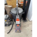 A VAX RAPIDE SPRING CLEAN CARPET CLEANER