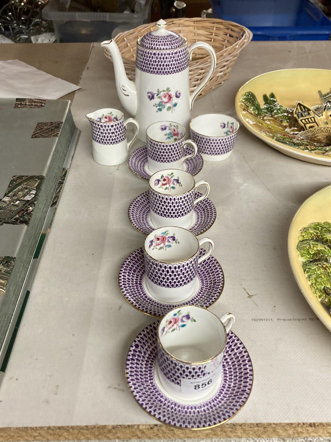 A NELSON CHINA PURPLE AND FLORAL COFFEE SET TO INCLUDE A COFFEE POT, CREAM JUG, SUGAR BOWL AND