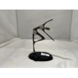 A METALWARE SCULPTURE OF A FIGURE DANCING HEIGHT 18CM