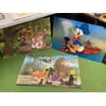THREE LARGE VINTAGE WALT DISNEY WALL PRINTS ON BOARD TO INCLUDE 'THE JUNGLE BOOK', 'DONALD DUCK' AND