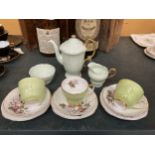 A PARAGON PALE GREEN COFFEE POT, CREAM JUG AND SUGAR BOWL PLUS THREE PALE GREEN CHINA TRIOS WITH