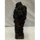 A LARGE HAND CARVED AFRICAN TRIBAL STYLE FIGURE H: 54CM