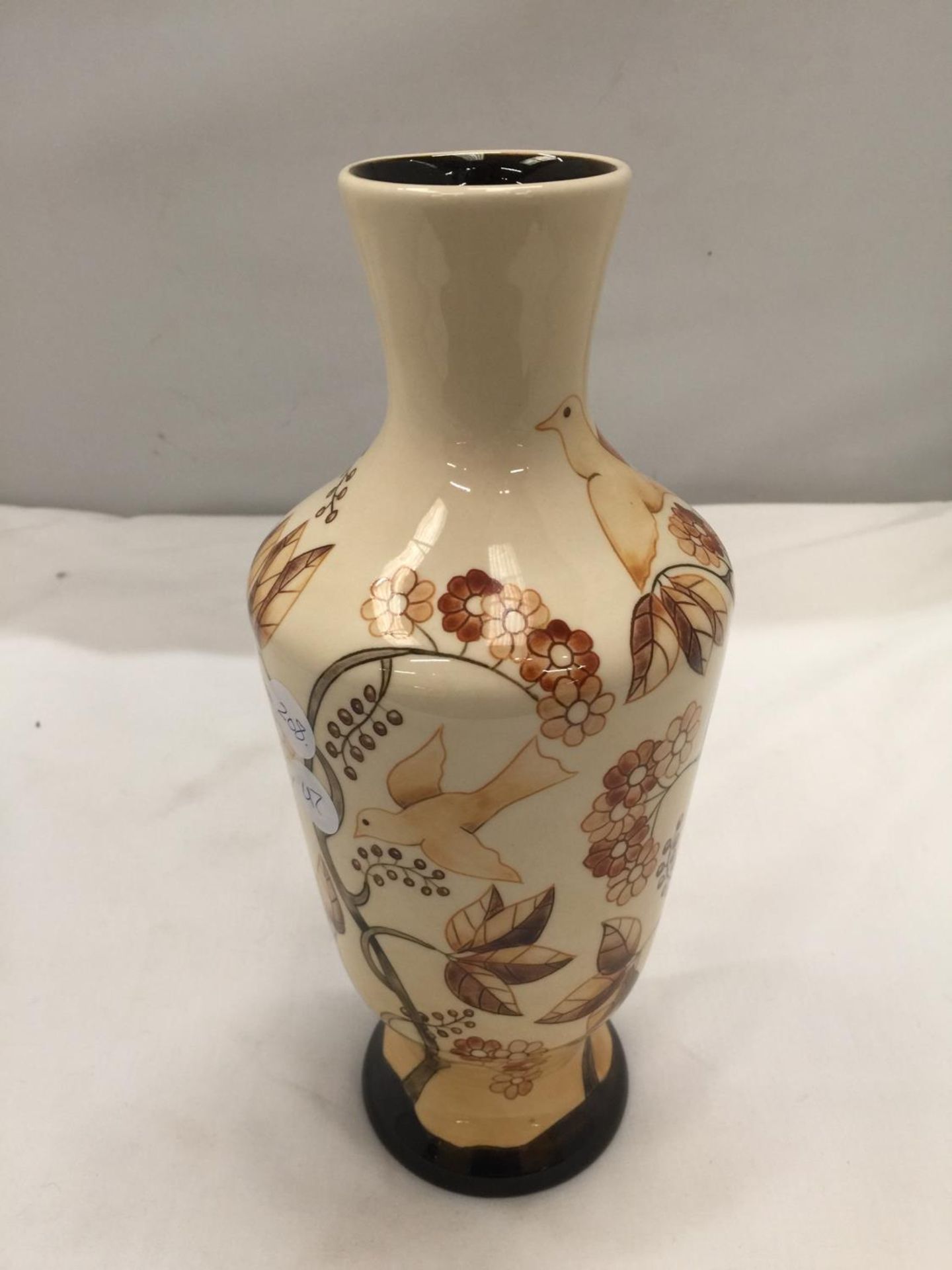 A COBRIDGE TRIAL VASE WITH IMAGES OF BIRDS AND TREES SIGNED TO THE BASE HEIGHT 26CM