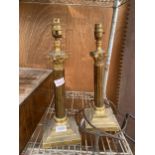 A PAIR OF DECORATIVE BRASS TABLE LAMPS