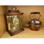 A COPPER KETTLE AND A MANTLE CLOCK