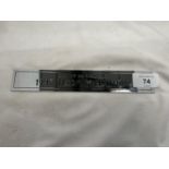 A 'BENTLEY BROOKLANDS 1997 TROPHY EDITION' SIGN 21CM X 3.5CM