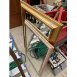A LARGE GILT FRAMED WALL MIRROR AND A FURTHER FRAMED MIRROR