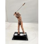 A LADY GOLFER TROPHY ON A WOODEN PLINTH HEIGHT 16.5CM