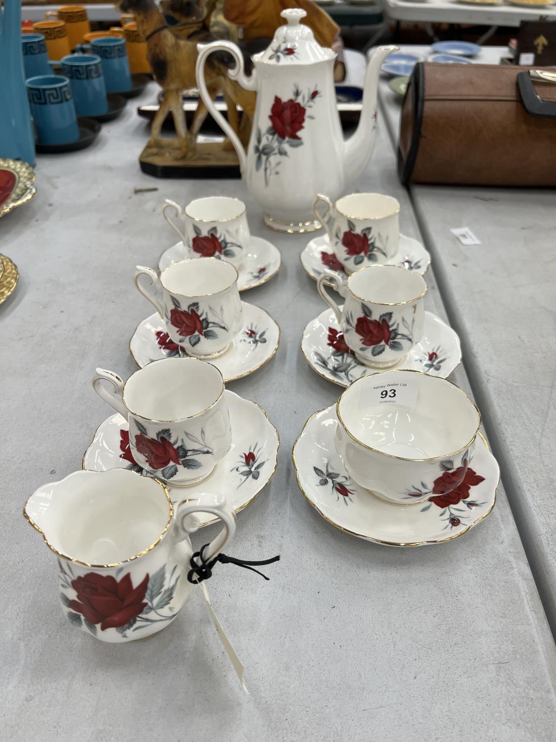 A ROYAL ALBERT 'SWEET ROMANCE' COFFEE SET TO INCLUDE A COFFEE POT, CREAM JUG, SUGAR BOWL, CUPS AND