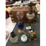 A QUANTITY OF SMALL OIL LAMPS TO INCLUDE BRASS AND GLASS EXAMPLES