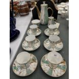 A LUSTRE COFFEE SET IN A HARLEQUIN PATTERN TO INCLUDE COFFEE POT, CREAM JUG, SUGAR BOWL, CUPS AND