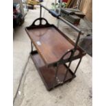 A VINTAGE WOODEN TWO TIER FOLDING TRAY