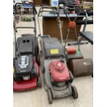 A HONDA PETROL ENGINE LAWN MOWER WITH GRASS BOX