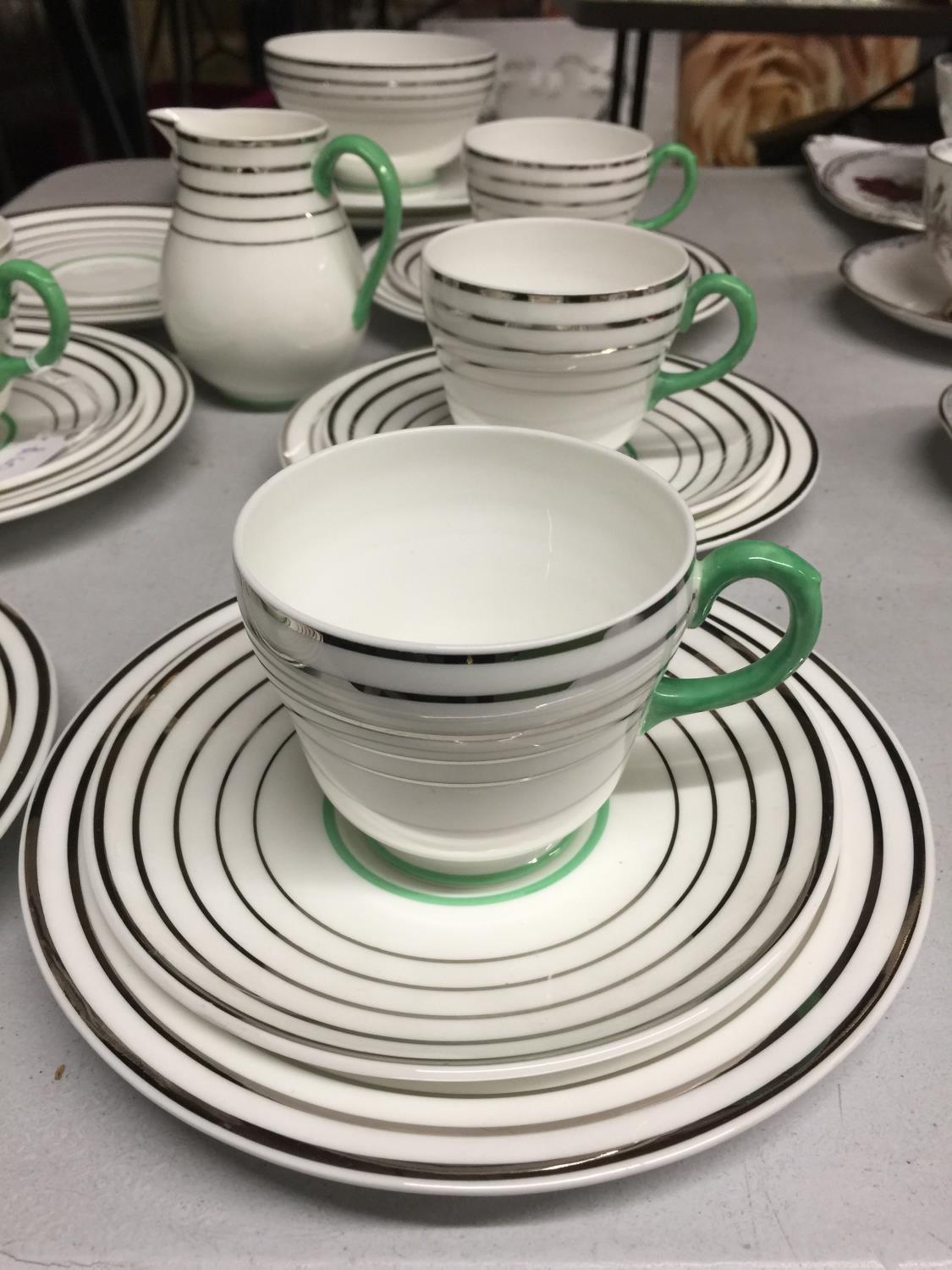 A WEDGWOOD BONE CHINA TEASET IN A SILVER AND GREEN COLOURED CIRCULAR DESIGN TO INCLUDE CAKE PLATES - Image 2 of 3