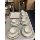 A PORCELAIN PART TEASET TO INCLUDE A CAKE PLATE, CUPS, SAUCERS AND SIDE PLATES