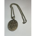 A MARKED SILVER NECKLACE AND LARGE LOCKET