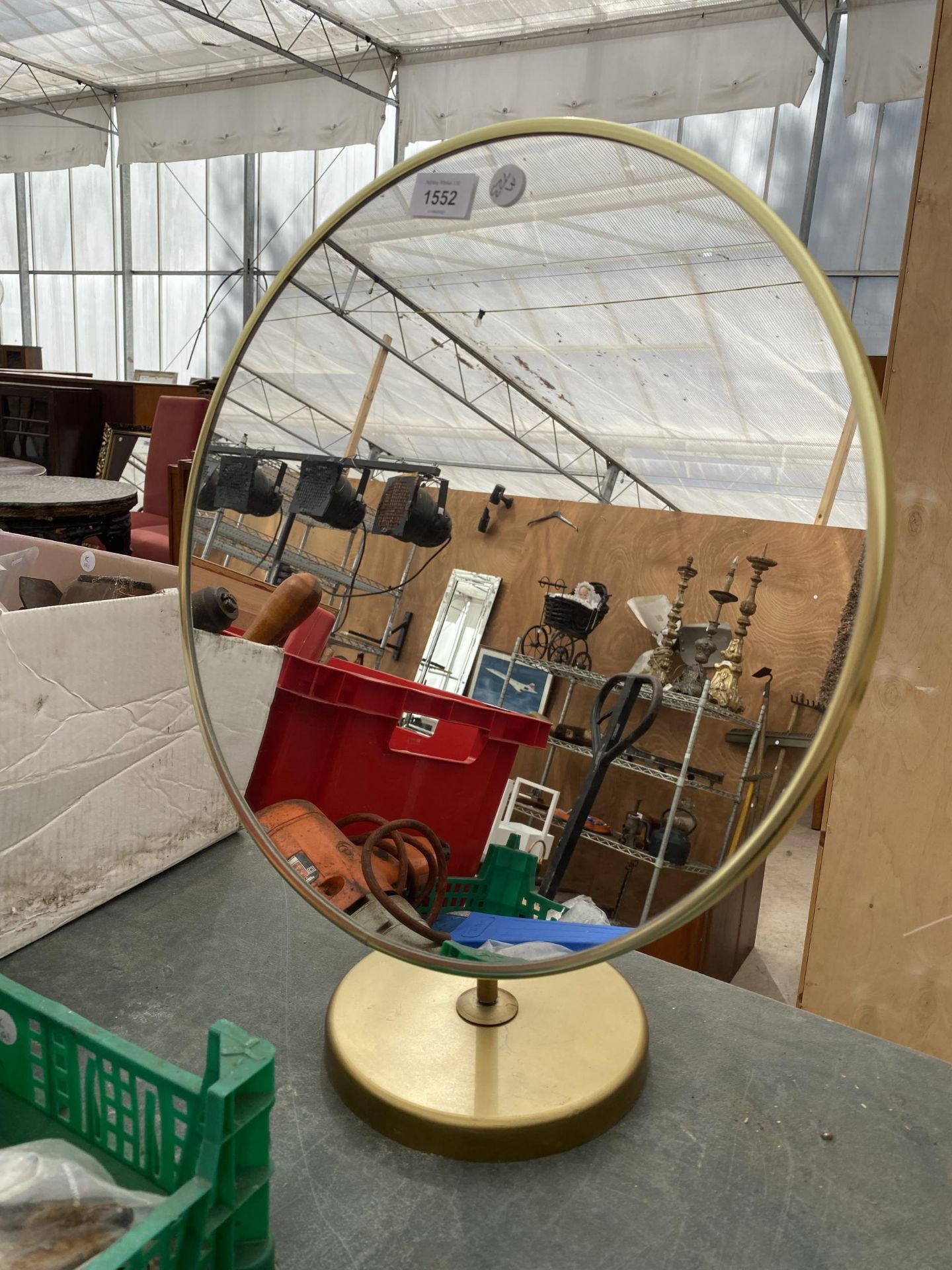 A LARGE VANITY MIRROR