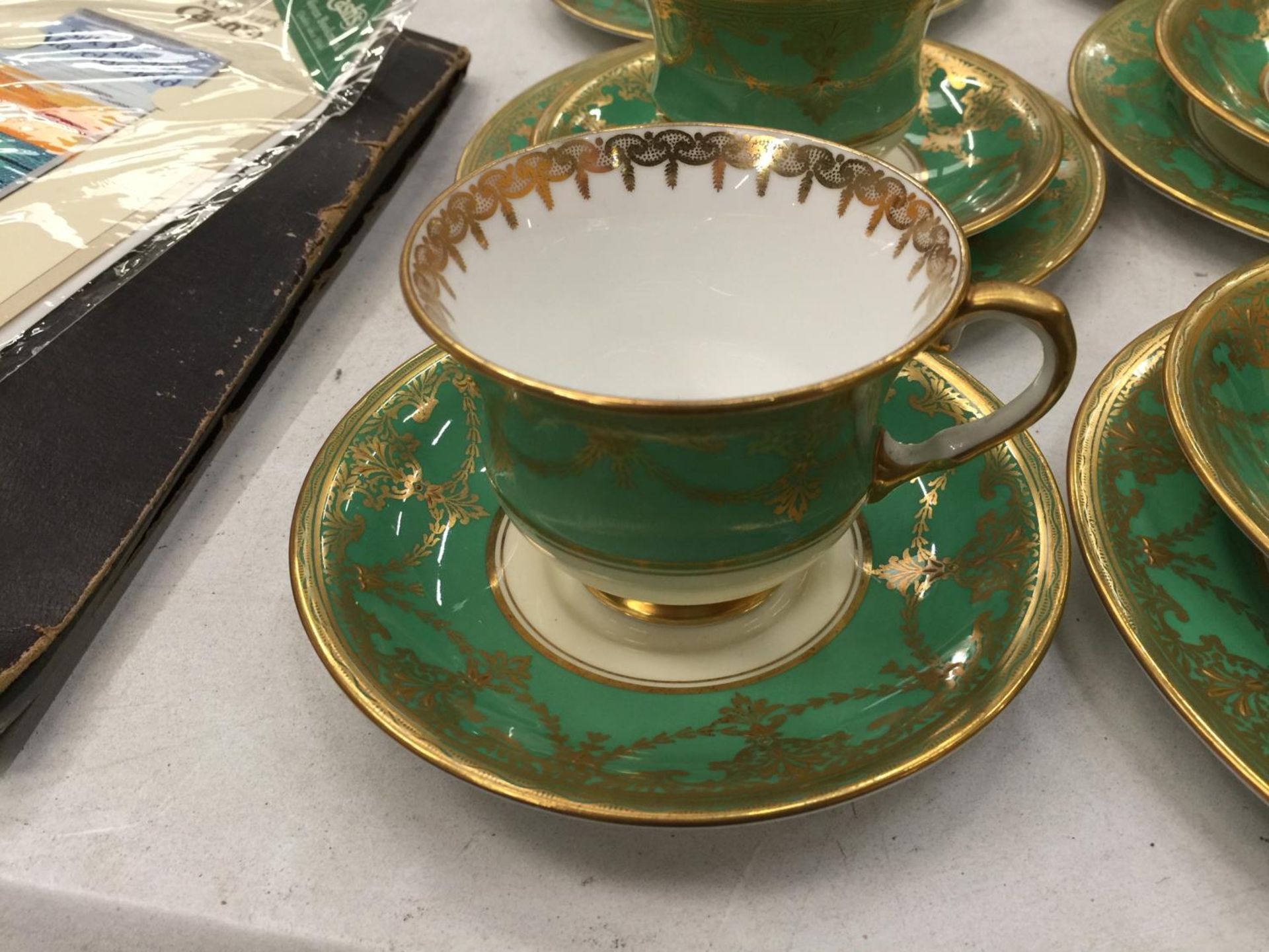 FIVE AYNSLEY GREEN AND GILT TRIOS PLUS A CUPA AND SAUCER - Image 3 of 6