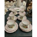 A WINDSOR BONE CHINA TEASET WITH PINK AND ROSE DECORATION AND GILDING TO RIMS AND HANDLES TO INCLUDE