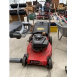 A CHAMPION LAWN MOWER WITH HONDA PETROL ENGINE AND GRASS BOX