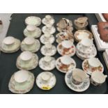 A LARGE QUANTITY OF VINTAGE CHINA AND PORCELAIN CUPS AND SAUCERS TO INCLUDE ROYAL DOULTON, ALFRED