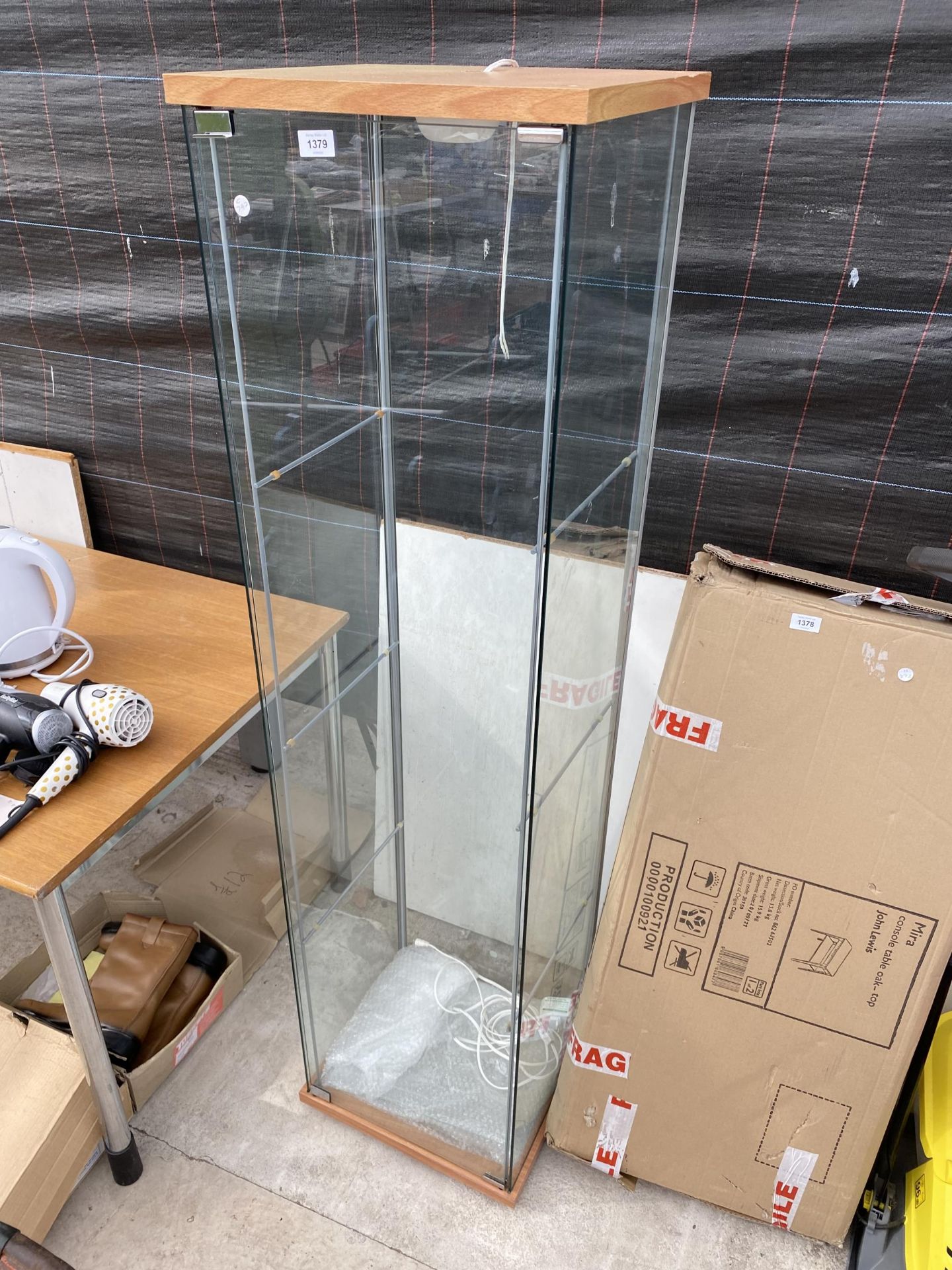 A GLASS SHOP DISPLAY CABINET