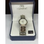 AN AS NEW ROMANO WRIST WATCH IN A PRESENTATION BOX SEEN WORKING BUT NO WARRANTY GIVEN