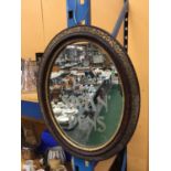 A VINTAGE OVAL SWAN PENS MIRROR WITH GILT DECORATION TO FRAME H: 49CM