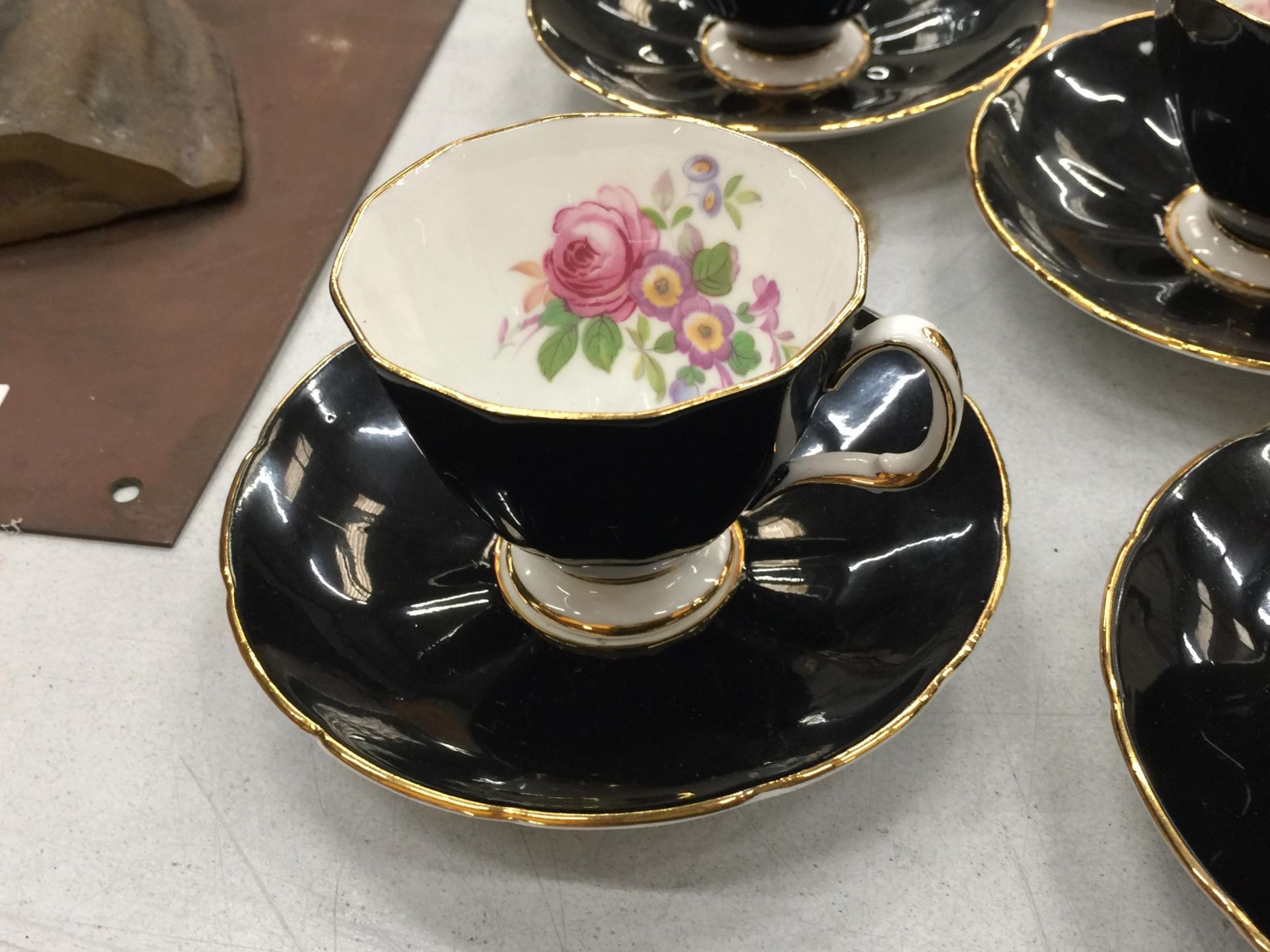 TWO VINTAGE PART TEASETS TO INCLUDE ADDERLEY FLORAL BLACK CUPS AND SAUCERS PLUS ART DECO STYLE - Image 2 of 7