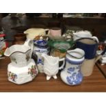 A COLLECTION OF VINTAGE JUGS TO INCLUDE BOVEY POTTERY TRANSFER PRINTED PIECES, GIBSONS, RINGTONS