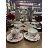 AN ASSORTMENT OF CHINA CUPS AND SAUCERS TO INCLUDE ROYAL CROWN DERBY 'DERBY POSIES', PARAGON,