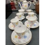 A DELPHINE CHINA TEASET TO INCLUDE A COFFEE POT, CREAM JUG, SUGAR BOWL, CUPS AND SAUCERS
