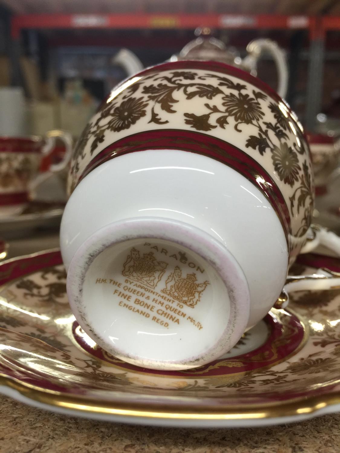 A PARAGON CHINA COFFEE SET IN A CRIMSON AND GILT PATTERN TO INCLUDE A COFFEE POT, CREAM JUG, SUGAR - Image 4 of 4