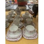 A DELPHINE CHINA TEA AND COFFEE SET IN A PALE PINK FLORAL PATTERN TO INCLUDE A TEA POT, COFFEE