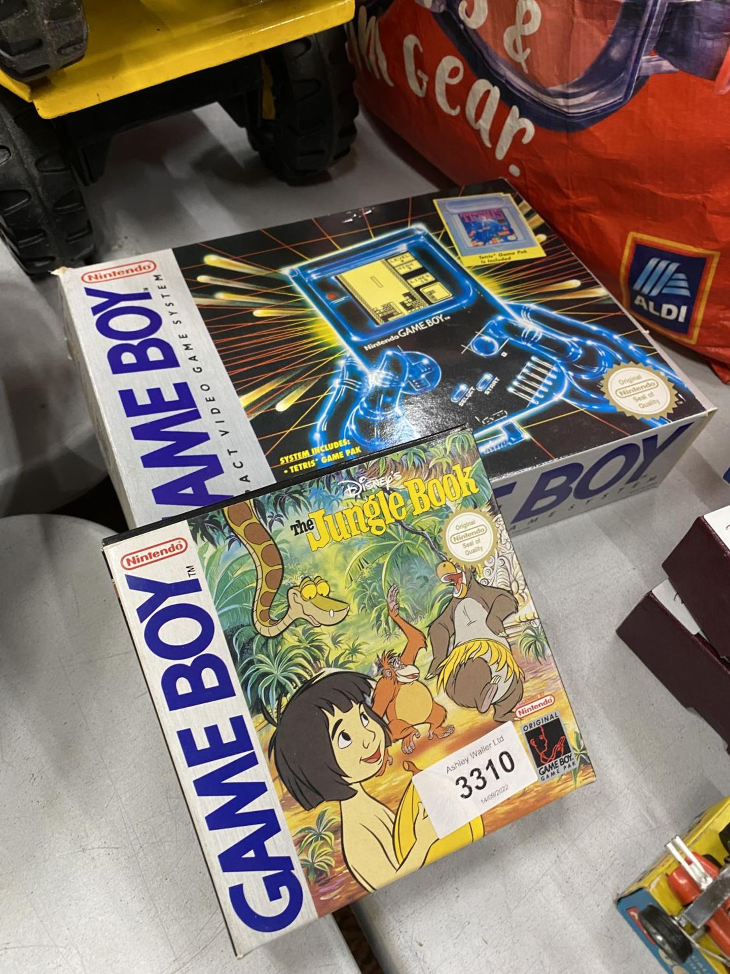 A BOXED NINTENDO GAMEBOY WITH A BOXED GAME JUNGLE BOOK