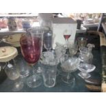A COLLECTION OF GLASSWARE AND GLASSES TO INCLUDE A CAKE STAND, VASES, JUGS, ETC PLUS BOXED WINE