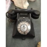 A VINTAGE BLACK GPO BAKELITE TELEPHONE WITH PULL OUT DRAWER MODEL NO. 312