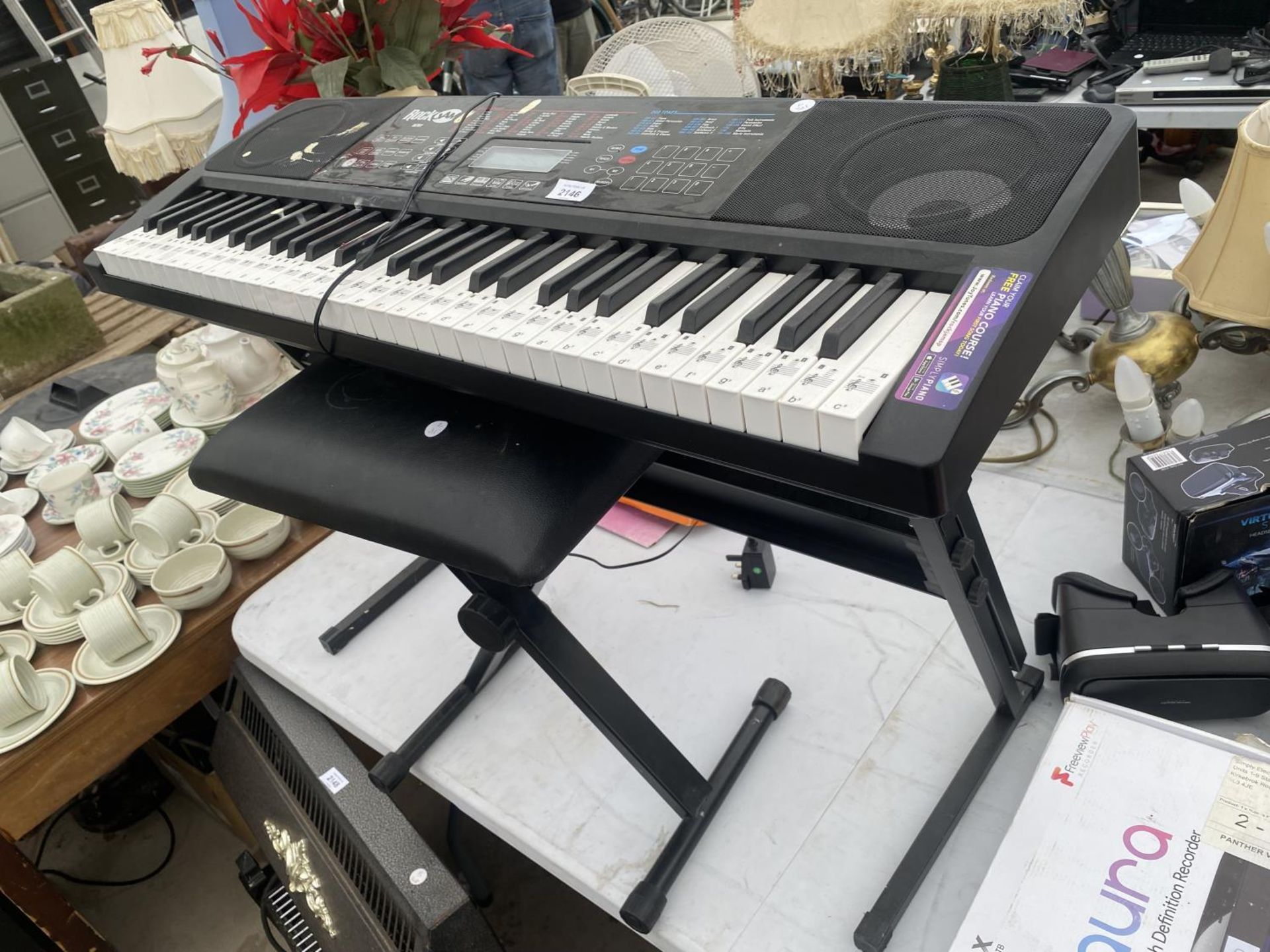 A ROCKJAM ELECTRIC KEYBOARD AND STOOL