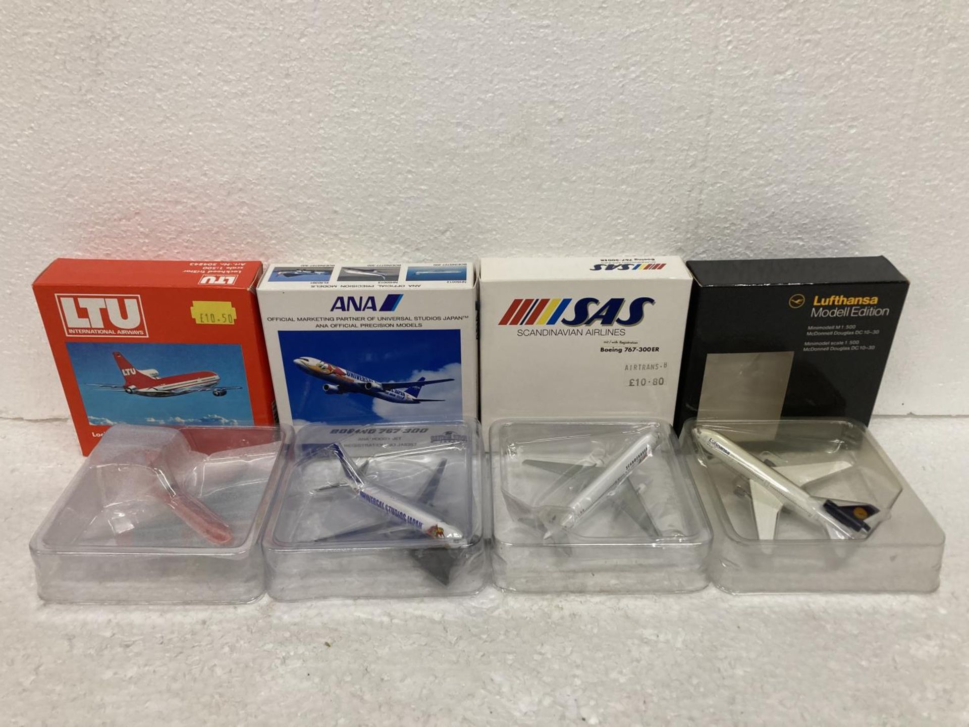 FOUR HERPA WINGS COLLECTION PLANES TO INCLUDE - A LOCKHEED TRISTAR MODEL 504843, ANA UNIVERSAL