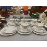 FIVE ROYAL STAFFORD CHINA TRIOS WITH FLORAL DECORATION
