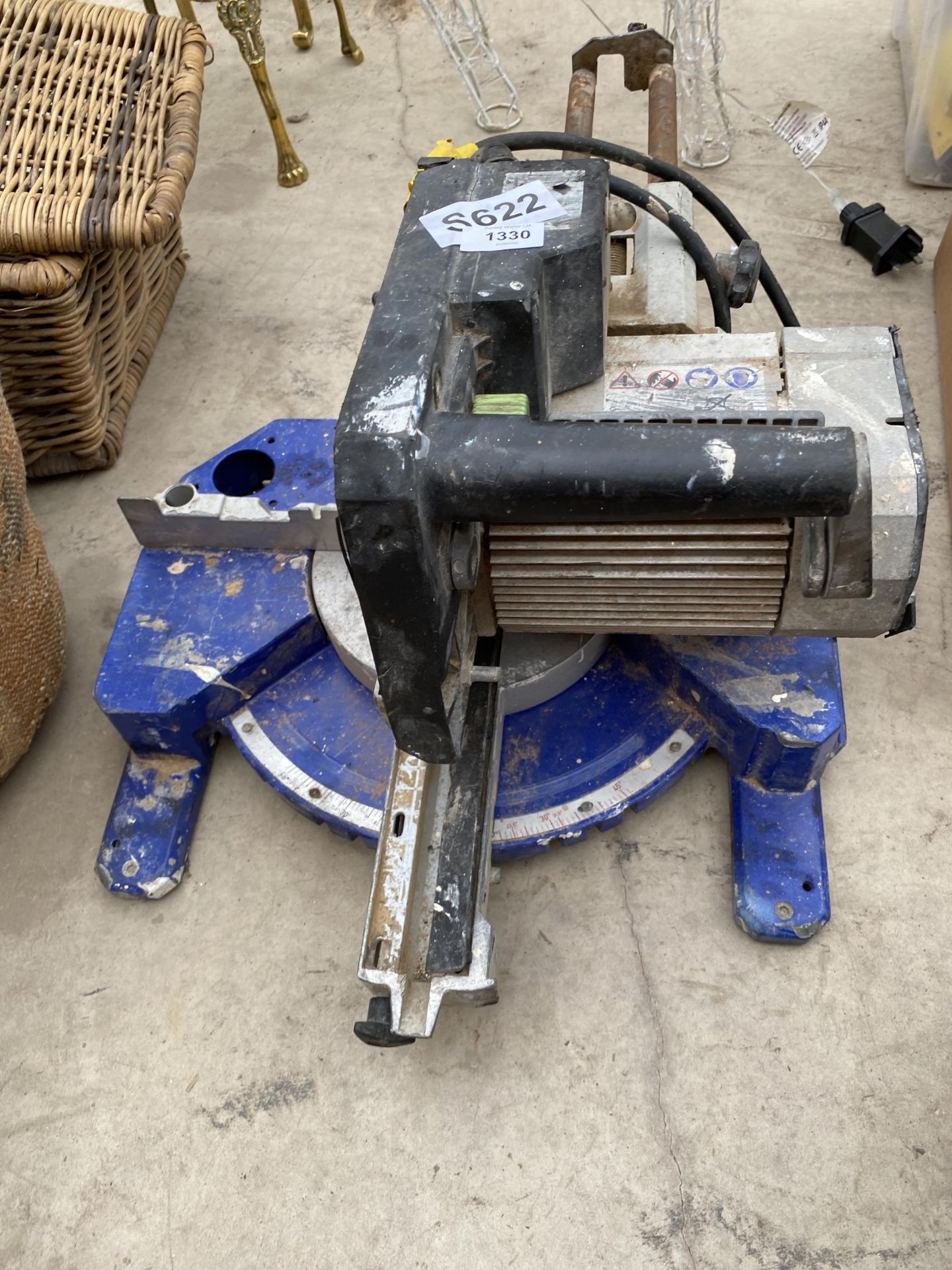 AN ELECTRIC MITRE SAW