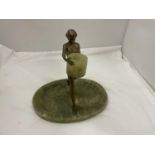 A BRASS LADY WITH AN ONYX TRAY BASE AND TEALIGHT STYLE HOLDER